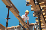 construction worker installing beam, Boise construction jobs