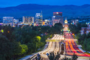 Boise, ID city skyline, night – Millennials are heading to smaller cities
