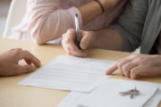 couple signing rental agreement, lease, idaho tenant laws