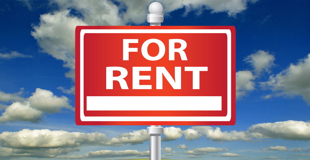 for rent sign, clouds in blue sky