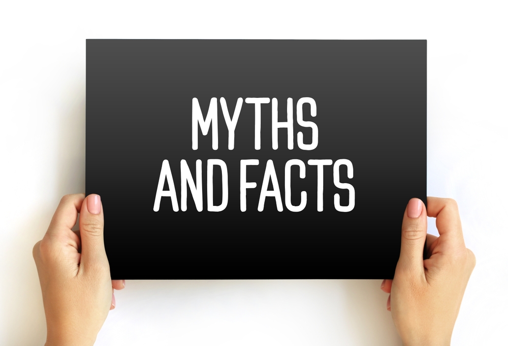 hands holding sign, myths and facts, hard money loans