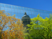 Idaho state capital reflected in downtown Boise building – Boise looks to future as green city