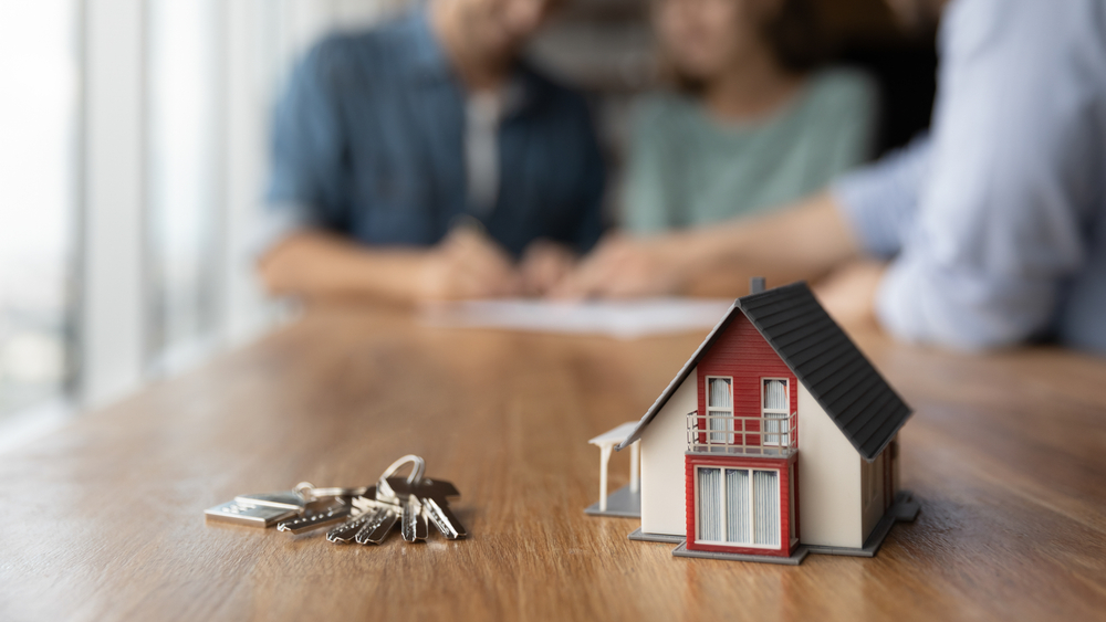 landlord and tenants, signing rental agreement, keys, model house